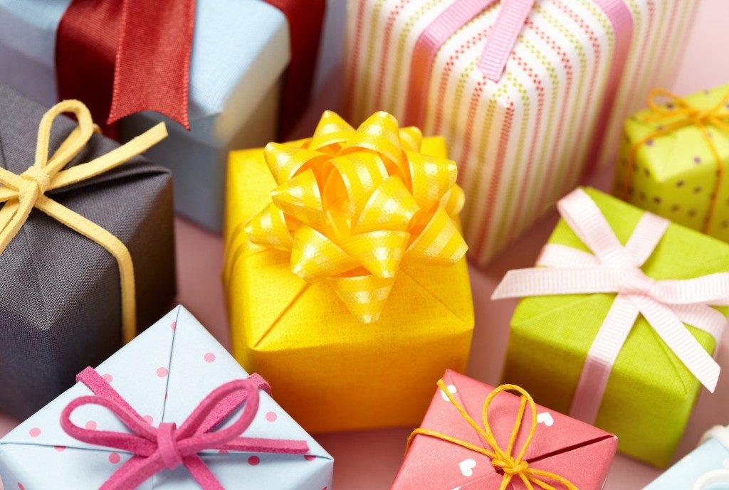 different colored gift boxes