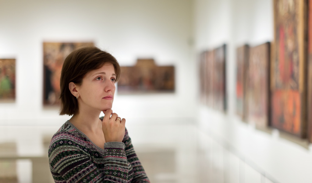 woman admiring art