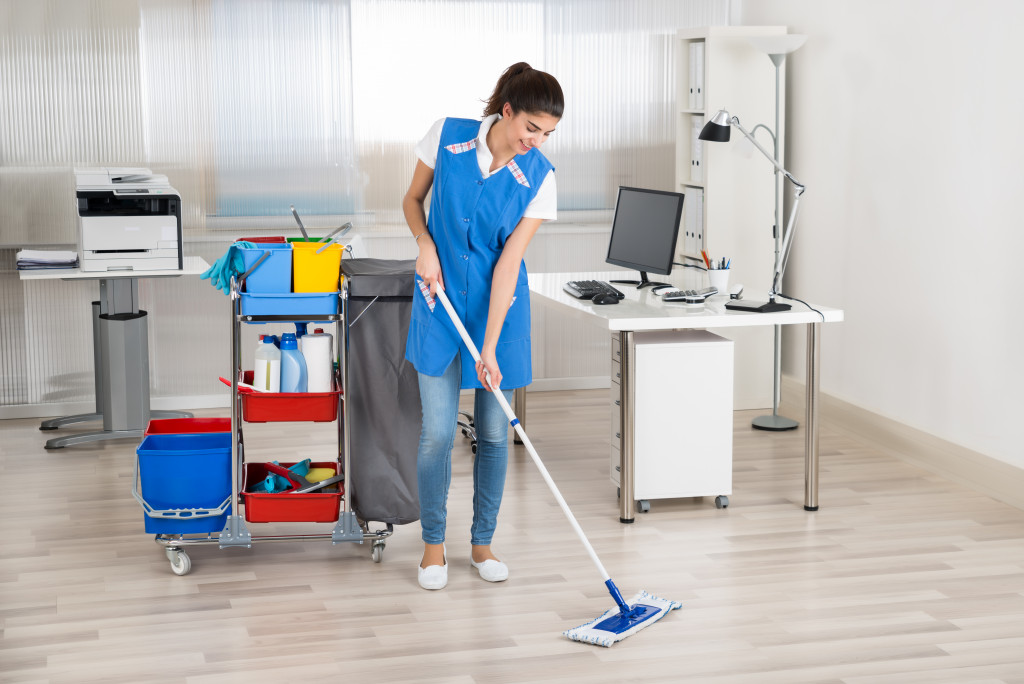 woman cleaning an office