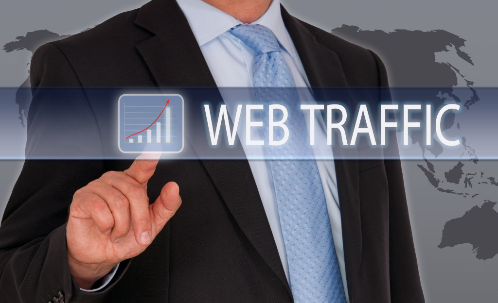 a man pointing on a website traffic status