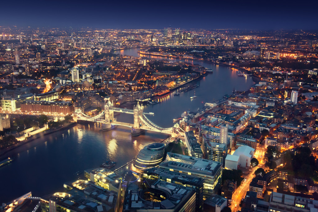night-time bird's eye view of london and different business buildings