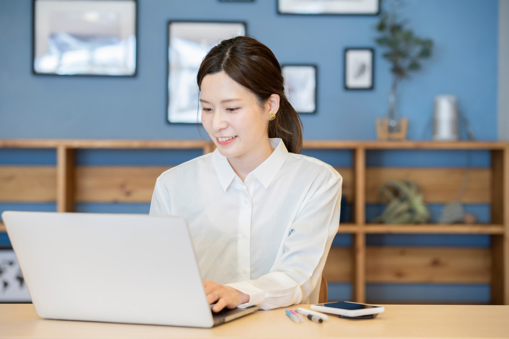 woman smiling while work from home